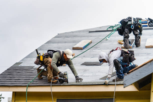 Professional Storm Damage Roof Repair technician working in Elmsford, NY